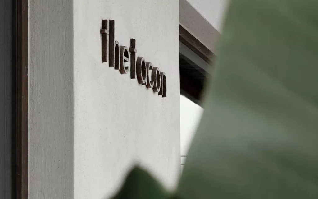 thetacon office exterior logo on wall