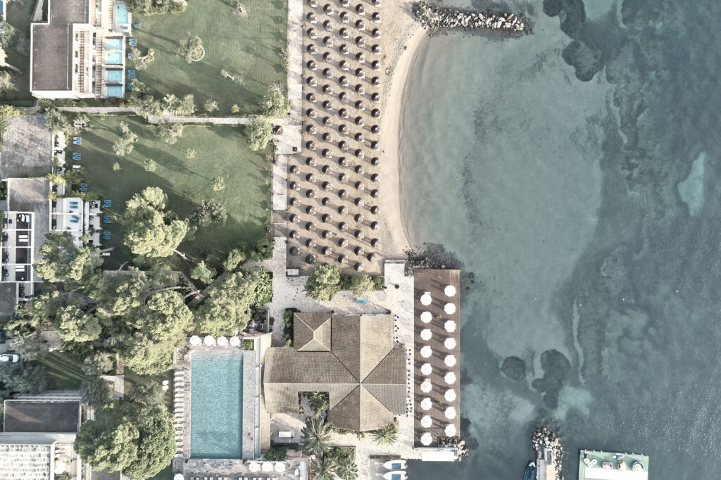 Thetacon Architecture Construction Corfu Kontokali Bay Resort and Spa in Kontokali sandy beach sun ionian sea featured 0